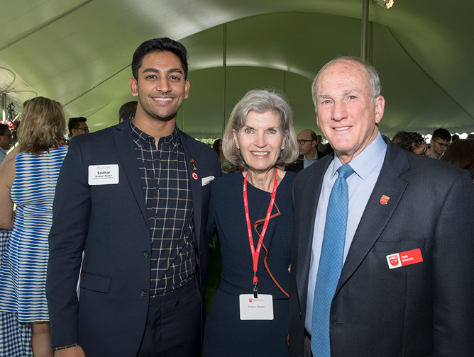 Sridhar Sriram stands with Francis and Robert Barchi 